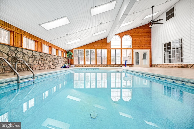 view of swimming pool featuring ceiling fan