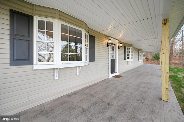 view of patio featuring a porch