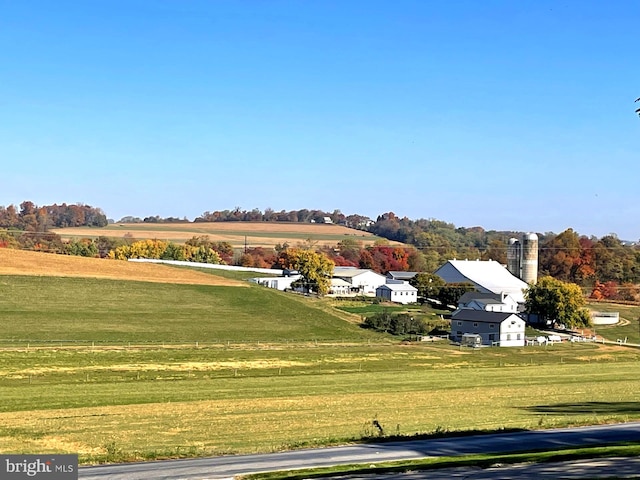 exterior space with a rural view