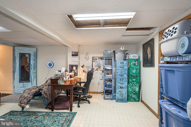 home office with a drop ceiling