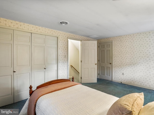 bedroom featuring dark carpet