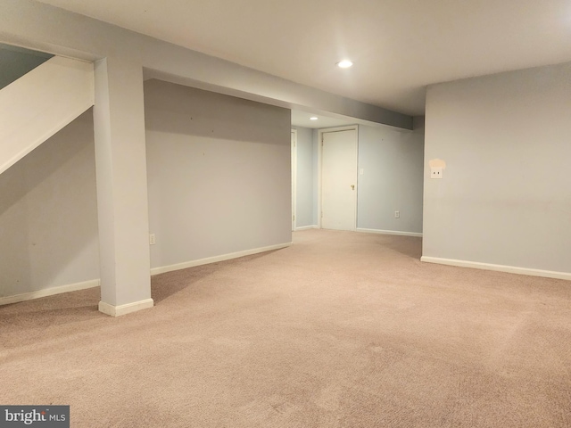 basement featuring carpet floors