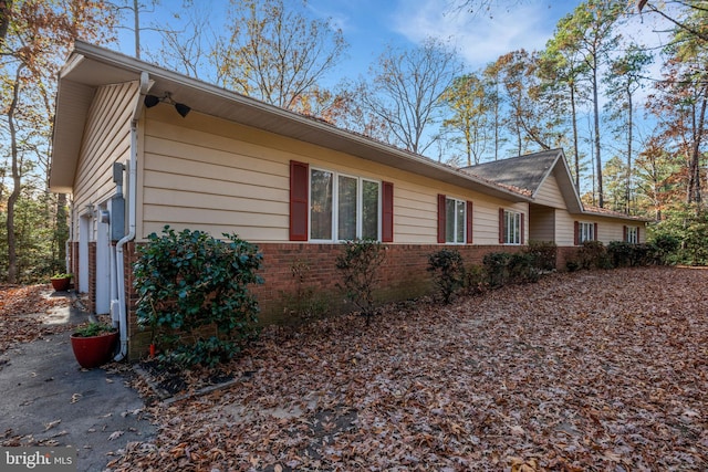 view of property exterior with a garage