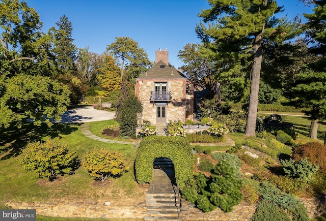 exterior space with a front yard