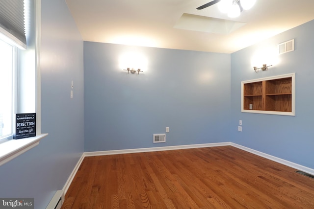 unfurnished room featuring wood-type flooring and ceiling fan