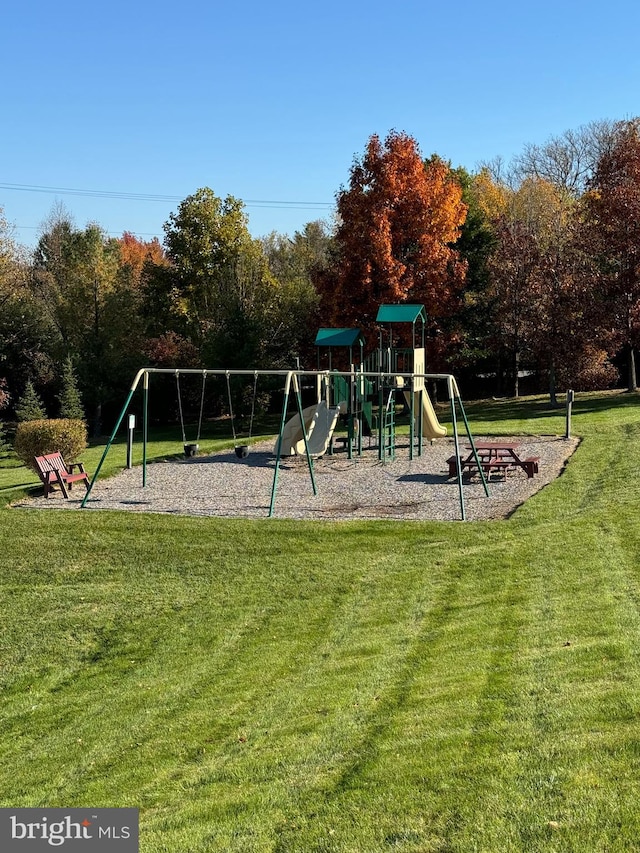 view of jungle gym featuring a yard