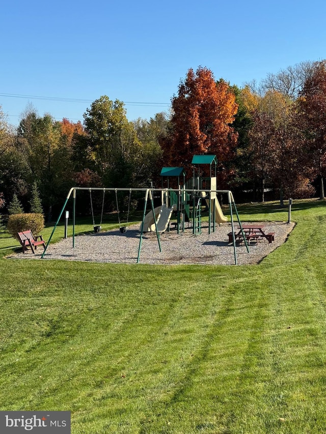 view of jungle gym with a yard