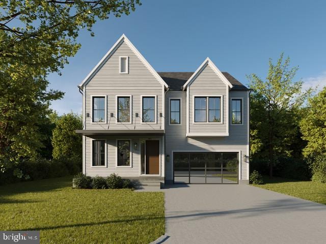 view of front facade with a front lawn and a garage