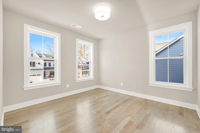 empty room featuring light hardwood / wood-style floors