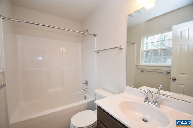 full bathroom with vanity, shower / tub combination, and toilet