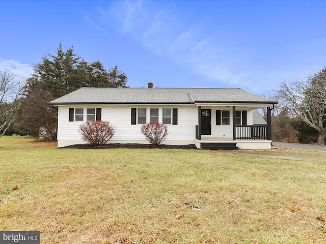 single story home with covered porch and a front lawn