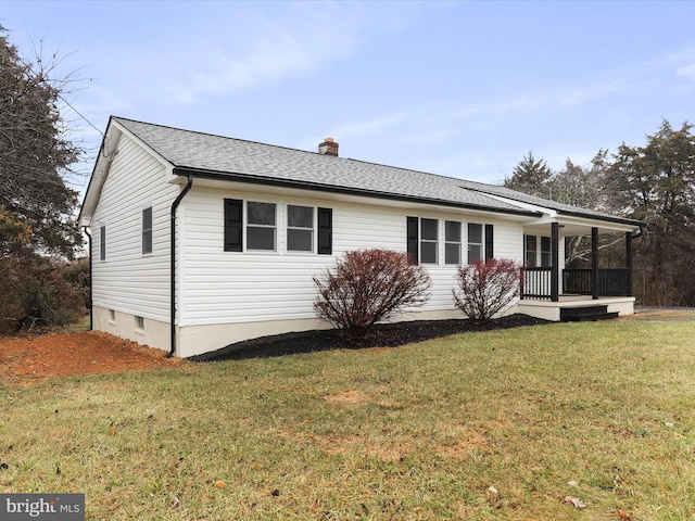 exterior space with a porch and a front lawn