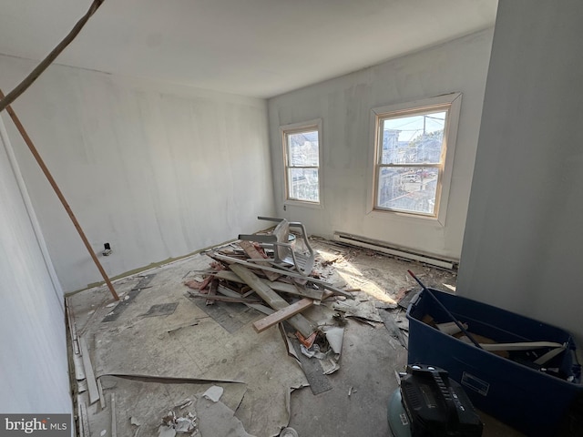 interior space featuring a baseboard heating unit