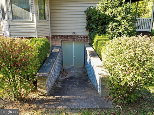 view of entry to storm shelter