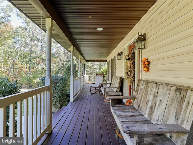 wooden terrace featuring a porch