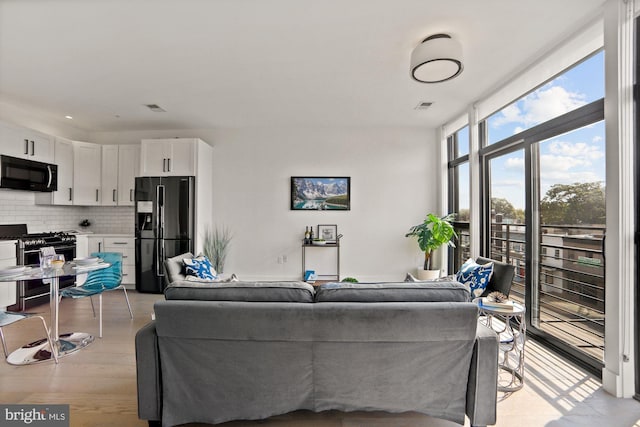 living room featuring light hardwood / wood-style flooring