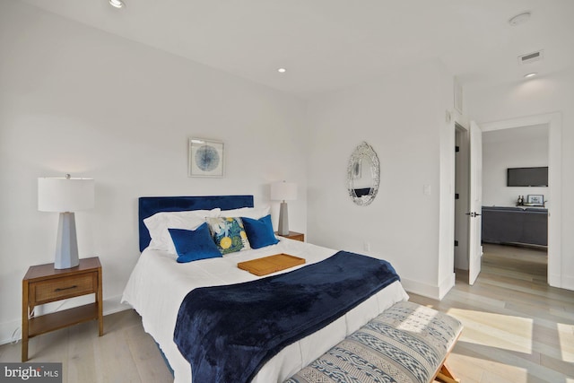 bedroom featuring light wood-type flooring