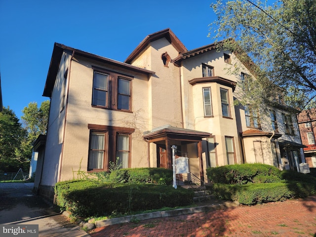 303 Washington St, Cumberland, MD 21502 - view of front of house with brick siding