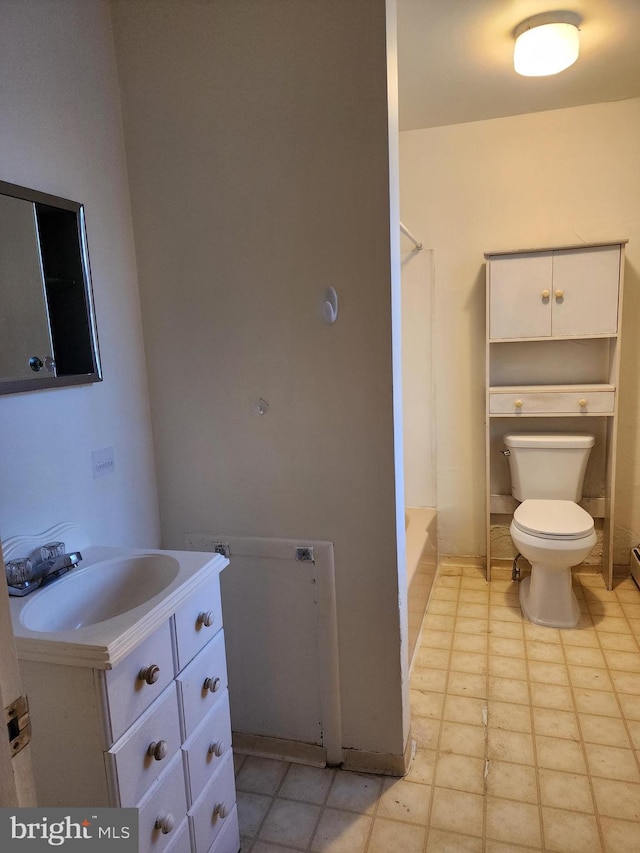 full bathroom featuring vanity, shower with separate bathtub, toilet, and tile patterned floors