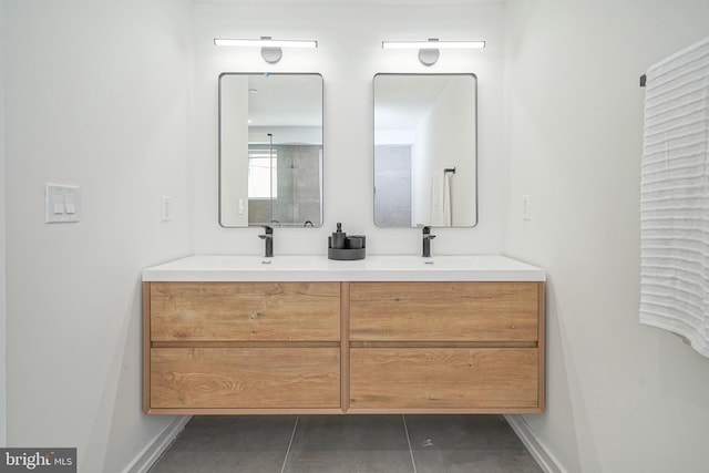 bathroom with vanity and tile patterned floors