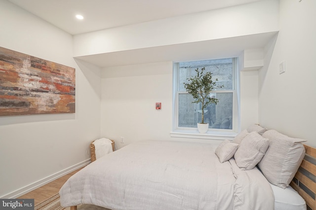 bedroom featuring hardwood / wood-style flooring