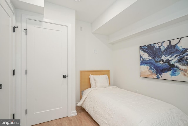 bedroom with light hardwood / wood-style floors