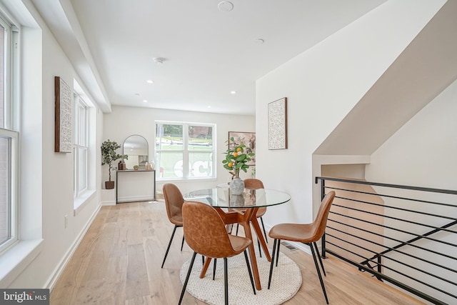 dining area featuring light wood-type flooring