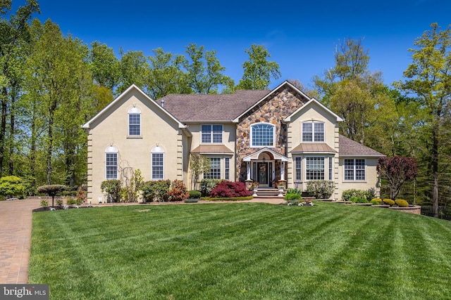 view of front of house with a front lawn