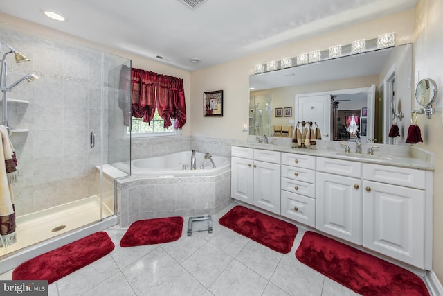 bathroom featuring vanity, independent shower and bath, ceiling fan, and tile patterned flooring