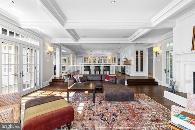 living room featuring beamed ceiling, french doors, coffered ceiling, and dark wood-type flooring