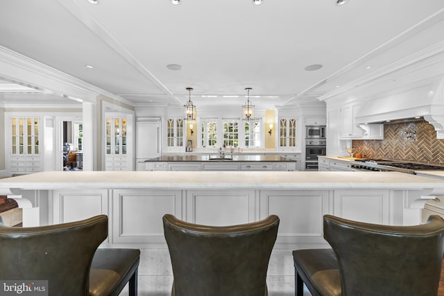 kitchen with a large island and white cabinets