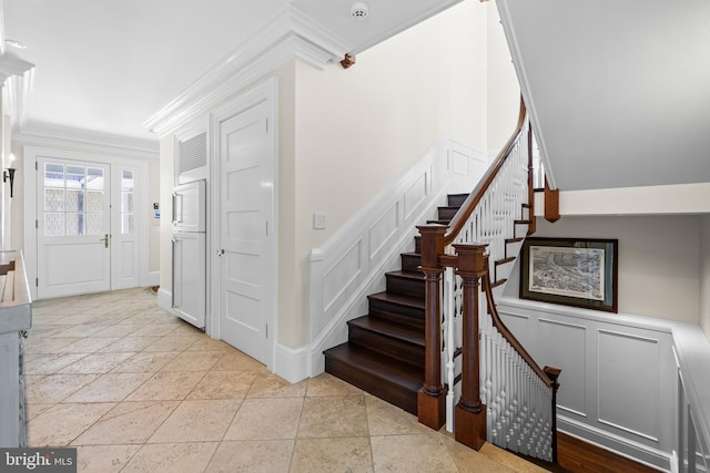 entrance foyer with crown molding