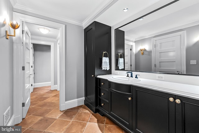 bathroom featuring vanity and crown molding