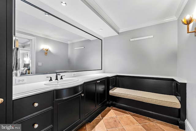 bathroom with vanity, tile patterned floors, and ornamental molding