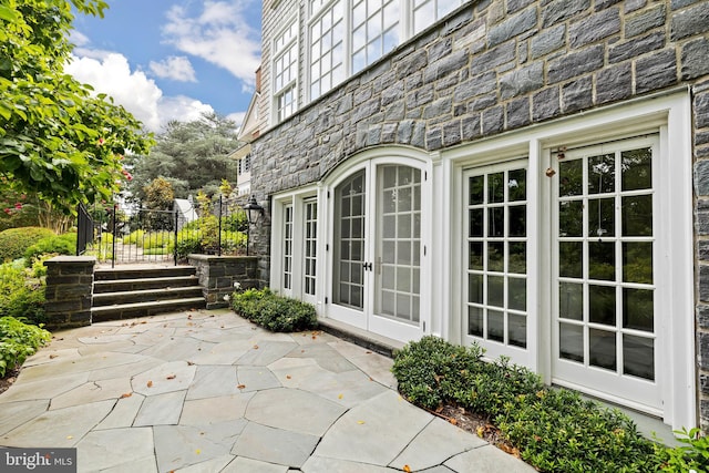 view of patio featuring french doors