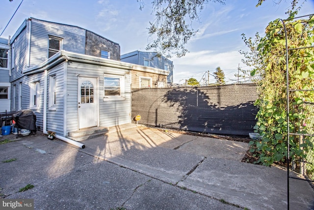 rear view of property with a patio