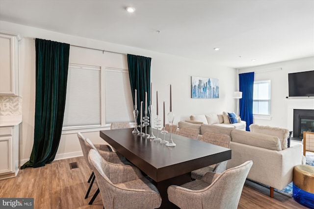 dining room with light wood-type flooring