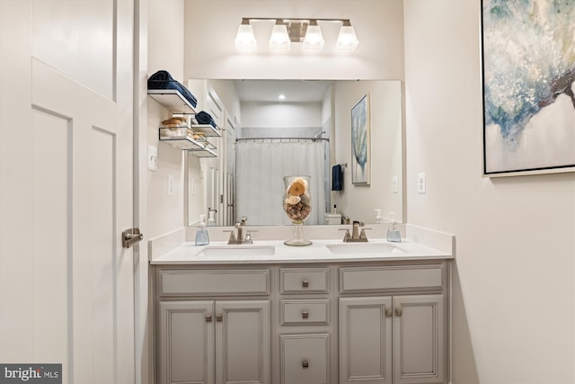 bathroom with vanity and walk in shower