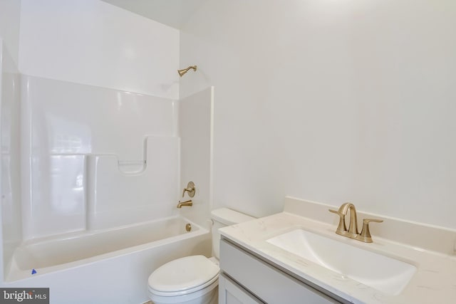 full bathroom featuring bathtub / shower combination, vanity, and toilet