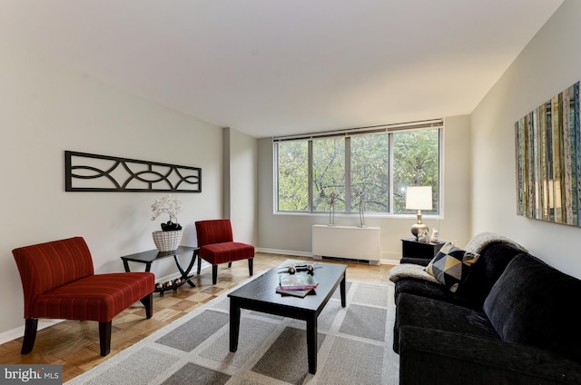 living room featuring parquet floors