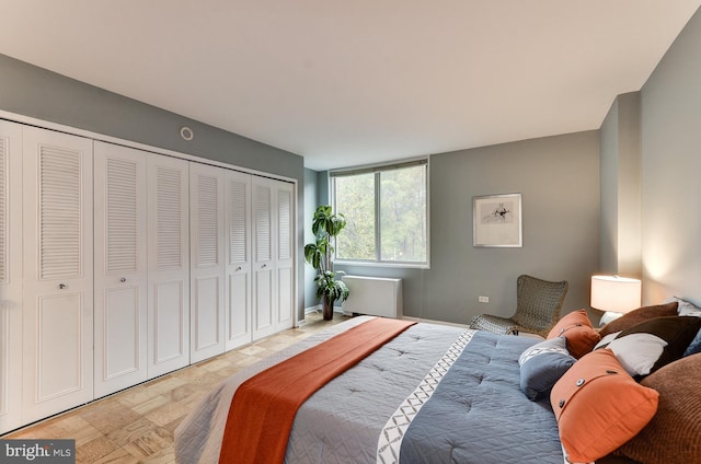 bedroom featuring baseboards and a closet