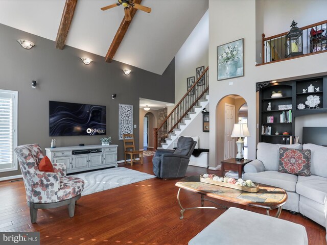 150 Depot Mills Dr, Gerrardstown, WV 25420 - living room with high vaulted ceiling, arched walkways, a ceiling fan, and stairway