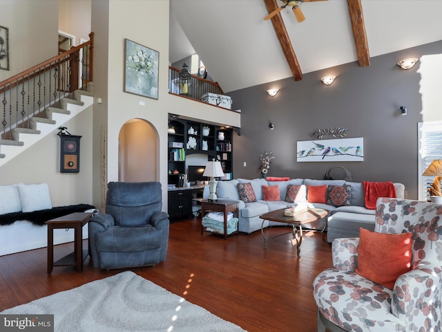 150 Depot Mills Dr, Gerrardstown, WV 25420 - living room with arched walkways, wood finished floors, stairs, ceiling fan, and high vaulted ceiling