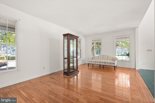 unfurnished room featuring light hardwood / wood-style floors