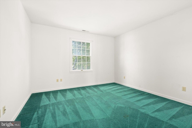 spare room with carpet