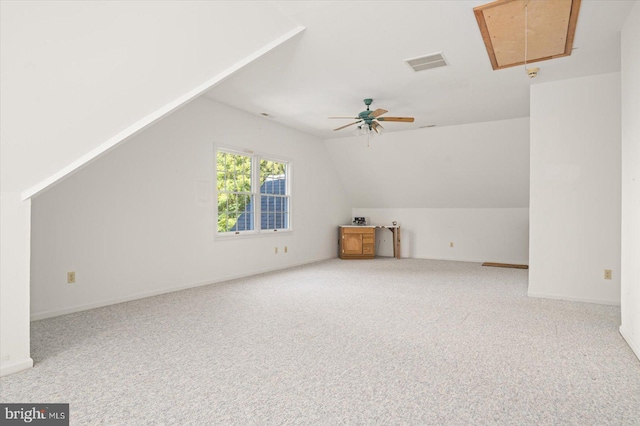 bonus room with ceiling fan, lofted ceiling, and carpet floors