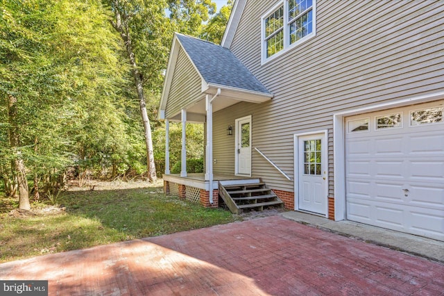 entrance to property with a garage