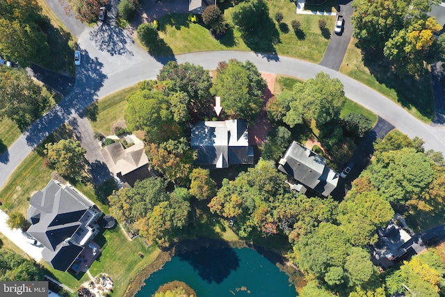 drone / aerial view with a water view