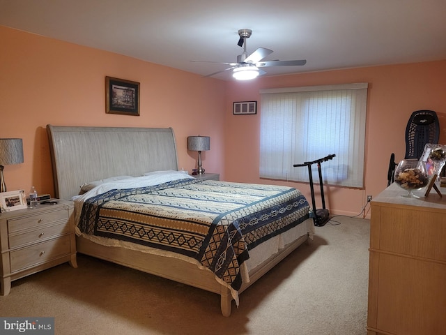 bedroom with light colored carpet and ceiling fan