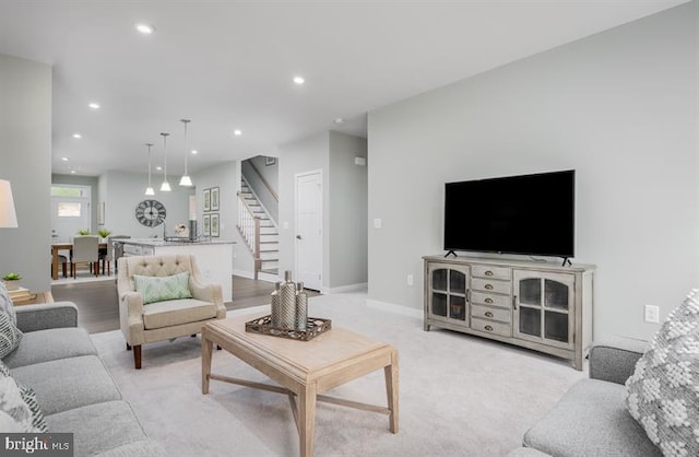 living room with light colored carpet